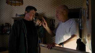 Stallone drinks raw eggs again as Razor trains under his Mickey, Louis "Lightning" Conlon (Alan Arkin).
