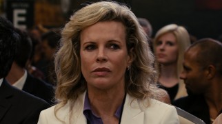 Sally (Kim Basinger), the woman who came between the two fighters, re-enters their lives.