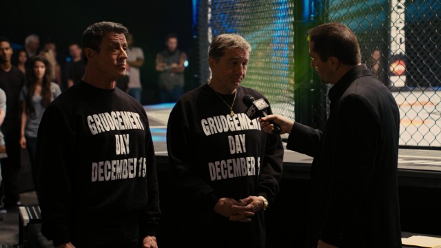 From their sweatshirts to your calendars: Razor (Sylvester Stallone) and Kid (Robert De Niro) get the word out about December 15th, a.k.a. Grudgement Day	.