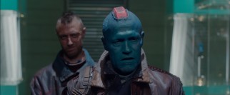 Peter's blue-skinned surrogate father Yondu Udonta (Michael Rooker) grows impatient in his pursuit of the plot-driving orb.