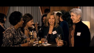 In the gag reel, Barbra Streisand has a laugh and a look at the camera after realizing non-speaking extras can't respond to her on camera chit-chat.
