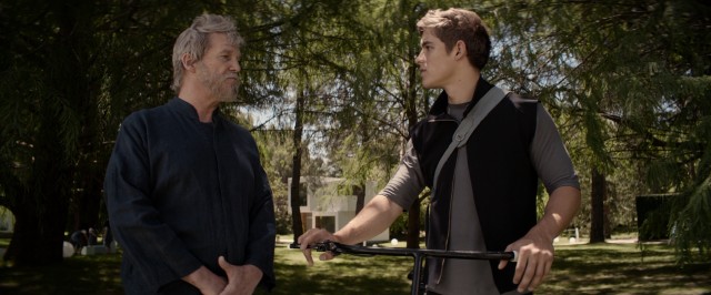 Under the tutelage of The Giver (Jeff Bridges), Jonas (Brenton Thwaites) begins to see the world in color.