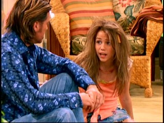With a French fry in her hair, Miley Stewart (Miley Cyrus) complains to her father for the very first time about the riot-inducing nature of her pop star alter ego in the "Hannah Montana" pilot episode.