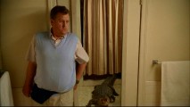 Snoopy gossip journalist Oswald Granger (Peter Gunn) is surprised to see a CGI alligator in his hotel room bathroom in this deleted scene.