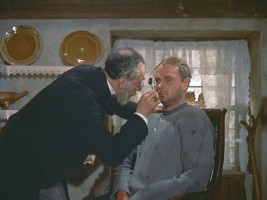 Dr. Boekman takes a look at Mr. Brinker's eyes.