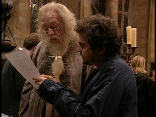 The two newbies to the series, Michael Gambon and director Alfonso Cuaron, consult one another on a PoA scene in A&E's hour-long documentary "The Magic Touch of Harry Potter."