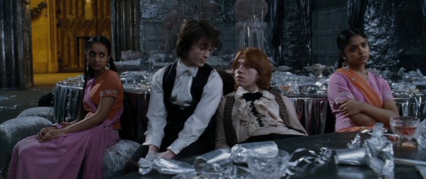 Twin sisters Parvati (Shefali Chowdhury) and Padma Patil (Afshan Azad) are not treated to a good time at the Yule Ball by their dates Harry (Daniel Radcliffe) and Ron (Rupert Grint).