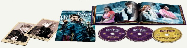 Warner's beauty shot of the contents of the Goblet of Fire Ultimate Edition: Ron and Mad-Eye Moody character cards, cover lenticular, hardcover sound & music book, and three discs.