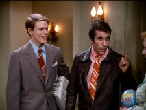 Fonzie as a door-to-door encyclopedia salesman. Customer: What volume do you recommend starting with? Fonzie: Aaaaayyyy!