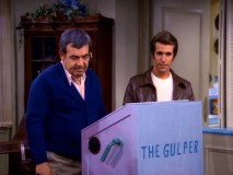 Howard (Tom Bosley) and Fonzie (Henry Winkler) give their collaborative garbage-compressing creation The Gulper a test run in "Fonz-How, Inc."