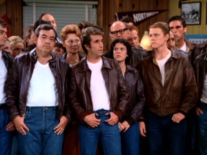 It's hard to miss the impact of Fonzie's popularity in a scene like this, where everyone in town opts for his trademark ensemble of white T, blue jeans, and leather jacket.