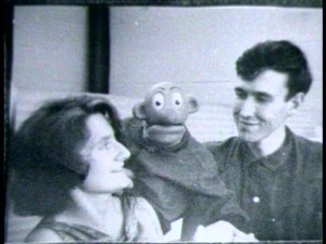 In this vintage photo, Jim Henson and future wife Jane Nebel have fun with a puppet on the set of "Sam and Friends."