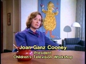 "Sesame Street" creator Joan Ganz Cooney recalls Henson's contributions in front of a feathery Big Bird rendering.