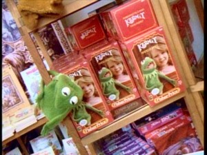Shelves of Muppet Stuff, a Lexington Avenue boutique shop full of exclusive Muppet merchandise open from 1980 to 1993, are seen as Henson describes how commercialism must be carefully tread.
