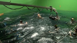A water tank and green screen are used to recreate the 2004 Indian Ocean tsunami with which the film dynamically opens.