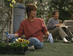 Jill (Patricia Richardson) and Tim (Tim Allen) both look over the fence for advice in this Season 2 moment.