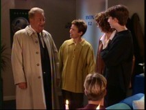 Rodney Dangerfield joins the Taylors (sans Tim) for their candlelit Thanksgiving dinner.