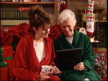With matching green and red robes, Jill and her Mom (Polly Holliday) overcome their problems to enjoy Christmas together.