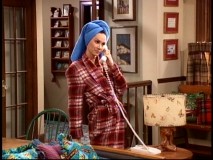 It's morning and Heidi's at Al's place wearing his flannel robe, leading Tim to suspect something's going on between his co-workers.