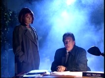 Scully and Mulder of The X-Files are spoofed in Tim's nightmare, in which he plays trenchcoat-wearing ABC Taylor amidst foggy extraterrestrial intrigue.