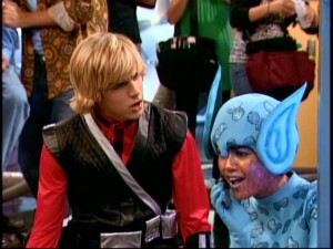 Posing as Mikayla, Miley accepts a phone call while filming a scene with Jake (Cody Linley), much to his chagrin.