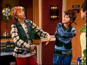 Miley and Lilly pick up a lesson or two from Mulan and cross dress in an effort to split the Jonas Brothers apart from Robby Ray. No, it doesnt make sense in the context of the episode, either.