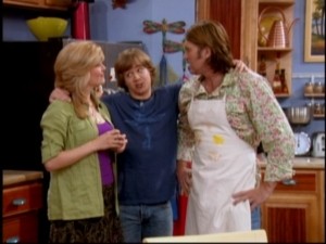 Jackson (Jason Earles) tries desperately to keep his dad (Billy Ray Cyrus) and teacher (guest Erin Matthews) from arguing.