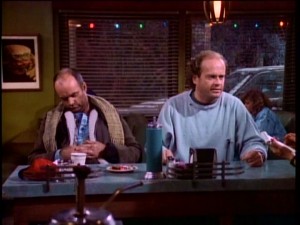 Frasier (Kelsey Grammer) gets Christmas dinner looking like his impoverished company at Lou's pitiful diner.