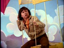 Like the geese in that Jeff Daniels movie, Jimmy (Jack Wild) tries to fly away home, only he uses a box kite.