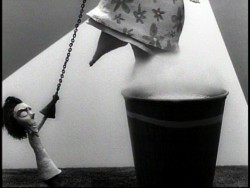Tim Burton's first directing job at Disney was the stop-motion short "Vincent." In this screencap from the film, Vincent Malloy uses his wild imagination to drop a relative into a steaming vat.