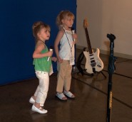 Smaller kids were content to merely sing and dance in the midst of musical instruments.