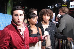 From right to left: Corbin Bleu, Monique Coleman, and this guy all look in different directions.