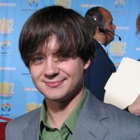 Is he 19? Is he 22? Is he 30? No one seems to know for sure how old Jason Earles is, but one look at his smile and early-'90s JTT hairdo clarifies that he doesn't mind.