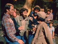 Everyone loves an Asian boy. Producer Frank Marshall, director Steven Spielberg, and producer/creator George Lucas are all smiles in the company of (Jonathan) Ke Huy Quan, in vintage production footage seen in Temple of Doom's new introduction.