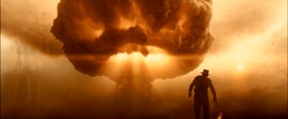 Even the mushroom cloud of a nuclear explosion can't render the silhouette of Indiana Jones less than recognizable.