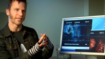HUD Design Supervisor Dav Rauch shows off his lovely fingerless gloves and "The Visual Effects of Iron Man."
