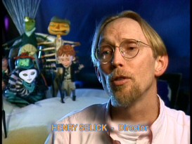 Henry Selick rocks a '90s center part and goatee while talking in front of his clay cast in the promotional Production Featurette.