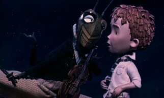 Grasshopper (voiced by Simon Callow) teaches James a few things about insect music.