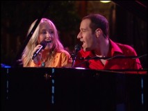 Brickman usually doesn't open his mouth during the numbers, but he can't resist the lure of a duet with Lila McCann.