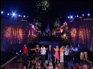 He decides on fireworks and a performer lineup, in spite of his diminutive stature.