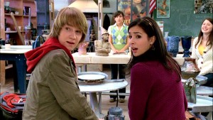 Pete (Jason Dolley) and Angela (Josie Loren) turn around to see who just proposed a goofy idea for the group's parade float in "Hatching Pete."