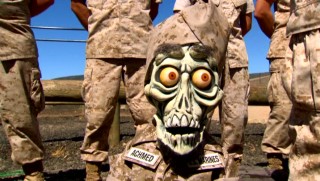Bushily-eyebrowed dead terrorist Achmed discovers the U.S. Marines isn't the easiest way to American citizenship.