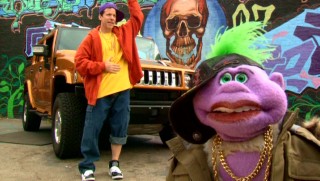 Indeterminate purple animal Peanut and Jeff Dunham rock out in some cool clothes, as puppet and ventriloquist are separated.