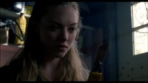 Needy (Amanda Seyfried) grimly eyes her weapon of choice for the confrontation to come in this deleted scene.