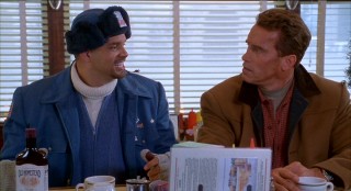 Sinbad goes postal as a mailman named Myron Larabee, seen here sharing some coffee and booze with Howard.