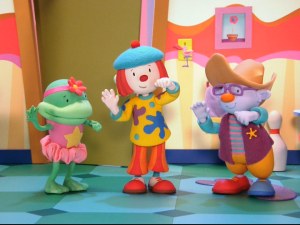 JoJo and two friends act out brushing their teeth to help out Goliath.