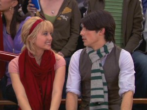 Stella (Chelsea Staub) tries to enjoy her awkward evening at a basketball game with Joe (Joe Jonas), unaware of his cold symptoms.