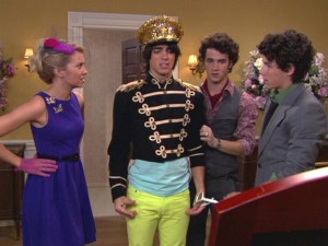 Joe isn't quite sure what to make of his Sgt. Pepper-inspired getup when meeting the Prime Minister.