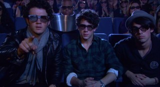 Kevin Jonas points at us in one final 3D effect whose intentions will be lost on those watching in 2D, a class that includes all DVD viewers.