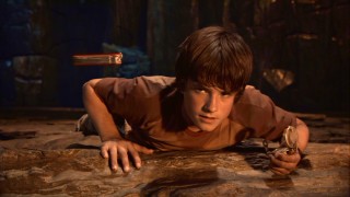 Sean (Josh Hutcherson) notices his Swiss Army knife defying gravity, as if by magic. Magic magnetism!